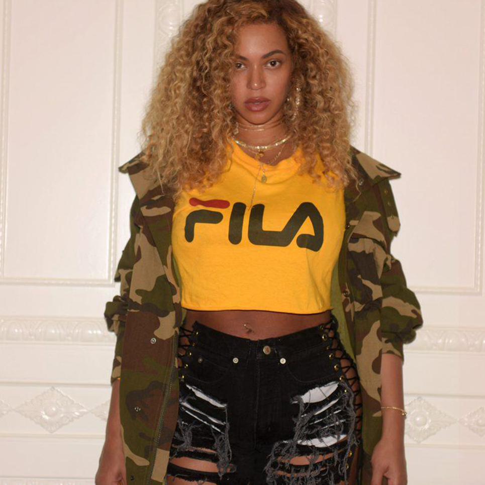 image of beyonce in a fila crop top produced by Custom Logos, a screenprinting example